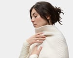 woman wearing home of wool poncho