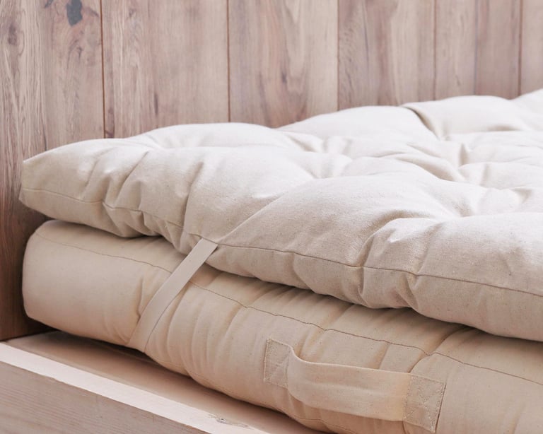 Wool mattress topper on top of a wool mattress