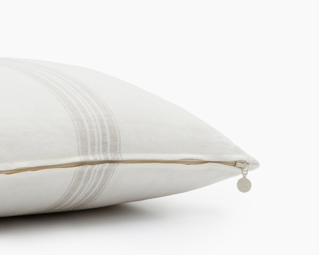 Wool throw pillow with linen pillowcase close up showing the zipper