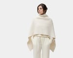 woman wearing home of wool poncho