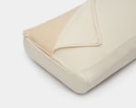 almohada de lana con los laterales lisos y funda