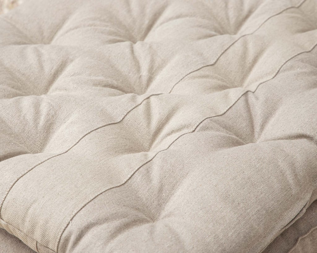 zero waste mattress topper close up showing different pieces of fabric sewn together