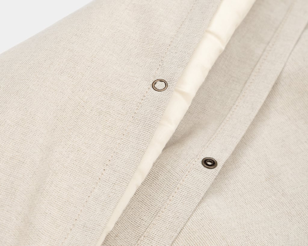 Dynetrekk i ull fra lin som blir kappet opp