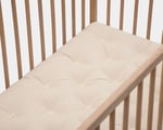 basta kids wool mattress detail in crib