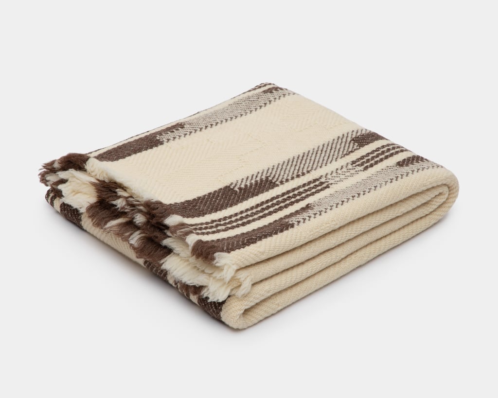 folded heavy wool blanket on white background