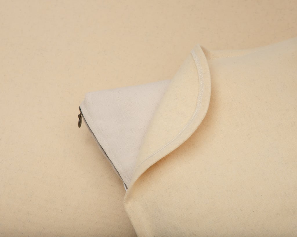 close up showing the bottom of a wool mattress protector