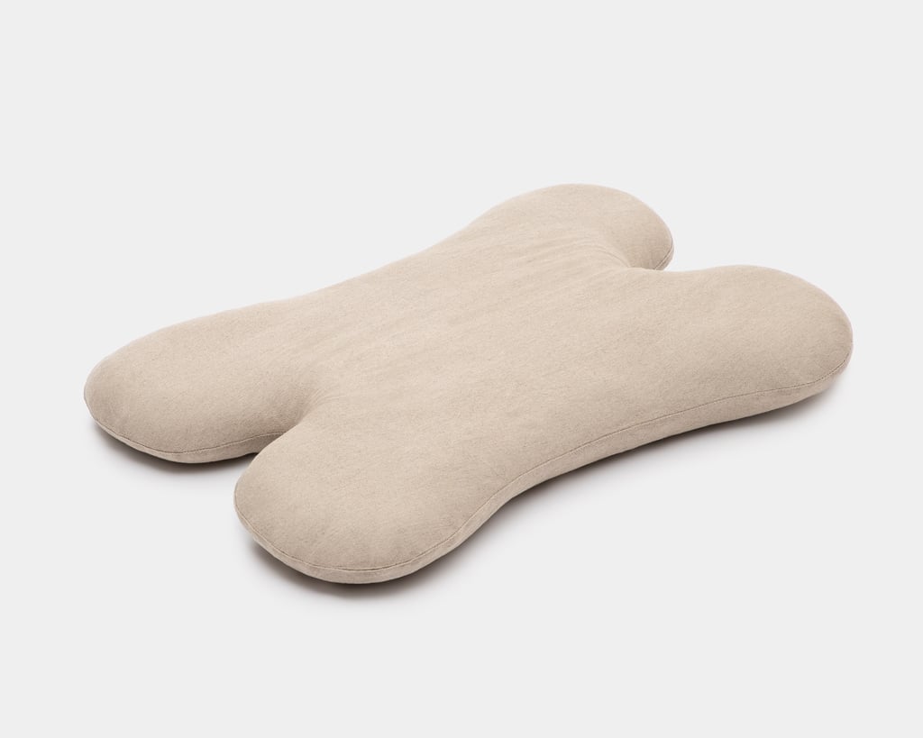 wool dog bed shaped like a bone