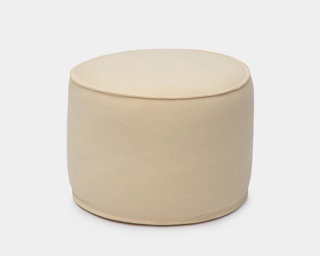 home of wool round pouf in virgin wool fabric
