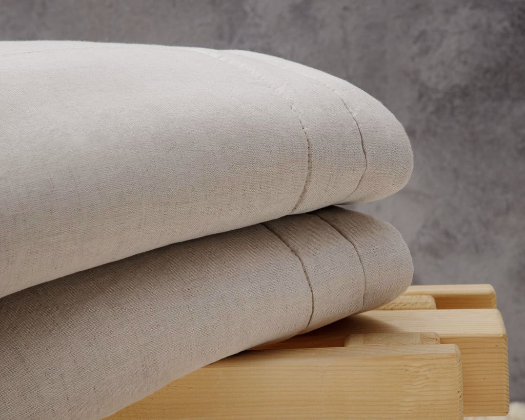 close up of Wool duvet insert folded from 59% linen and 41% cotton