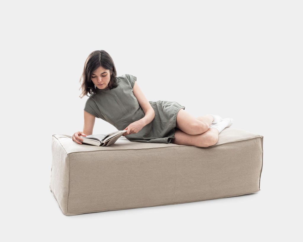 Foldable wool mattress with a person on it