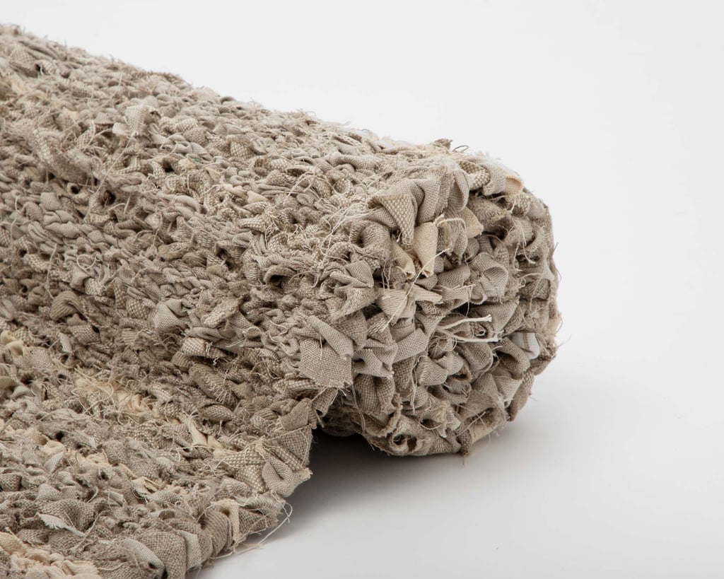 läheltä katsottuna rullattu moderni käsin kudottu pellavamatto