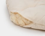 Wool papasan cushion in 100%oragnic cotton detail showing wool