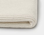 home of wool poncho folded