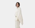 woman wearing home of wool poncho