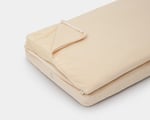home of wool crib mattress topper with wool batting showing