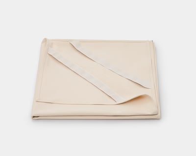 home of wool cotton protector with the straps visible
