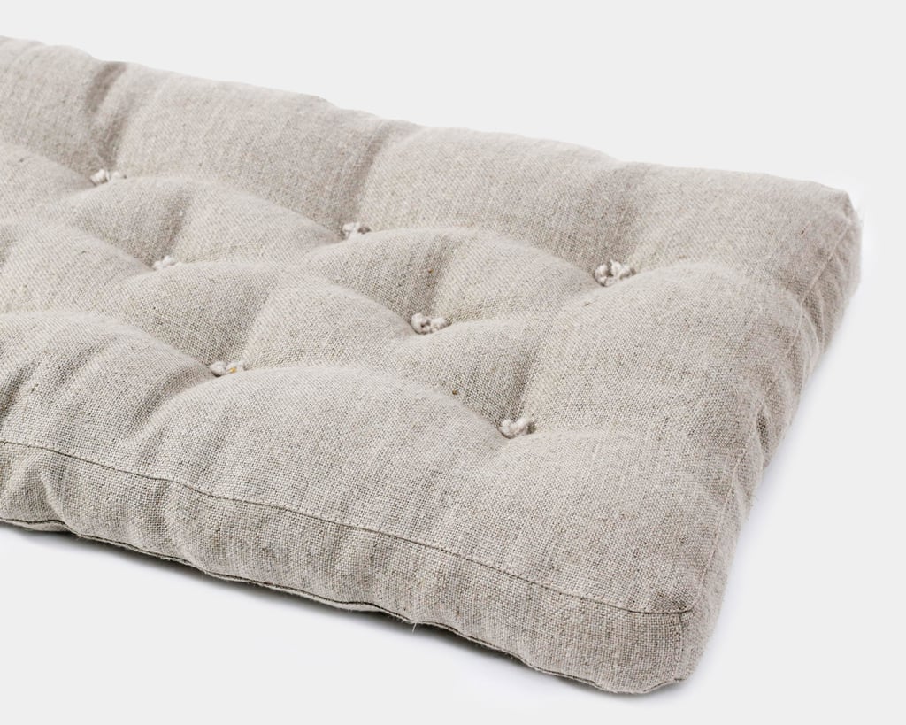 wool tufted seat cushion in 100% textured linen