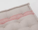 wool tufted seat cushion in red striped linen