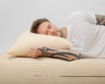 wool pillow with a man sleeping on it