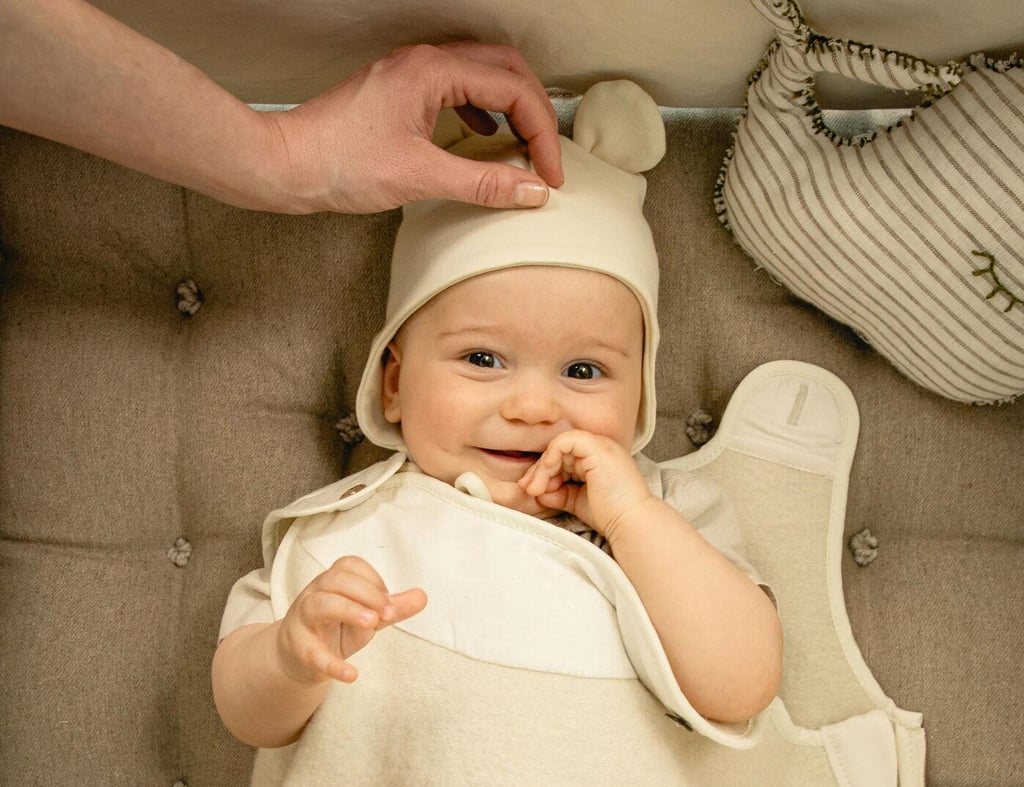 wool baby sleeping bag with a baby in it