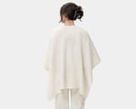 woman wearing home of wool wool-shawl