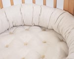 home of wool bed snake pillow in a crib