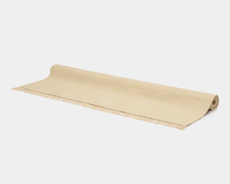 flat woven wool rug in natural white color