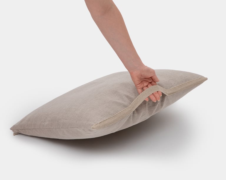wool travel pillow with hand