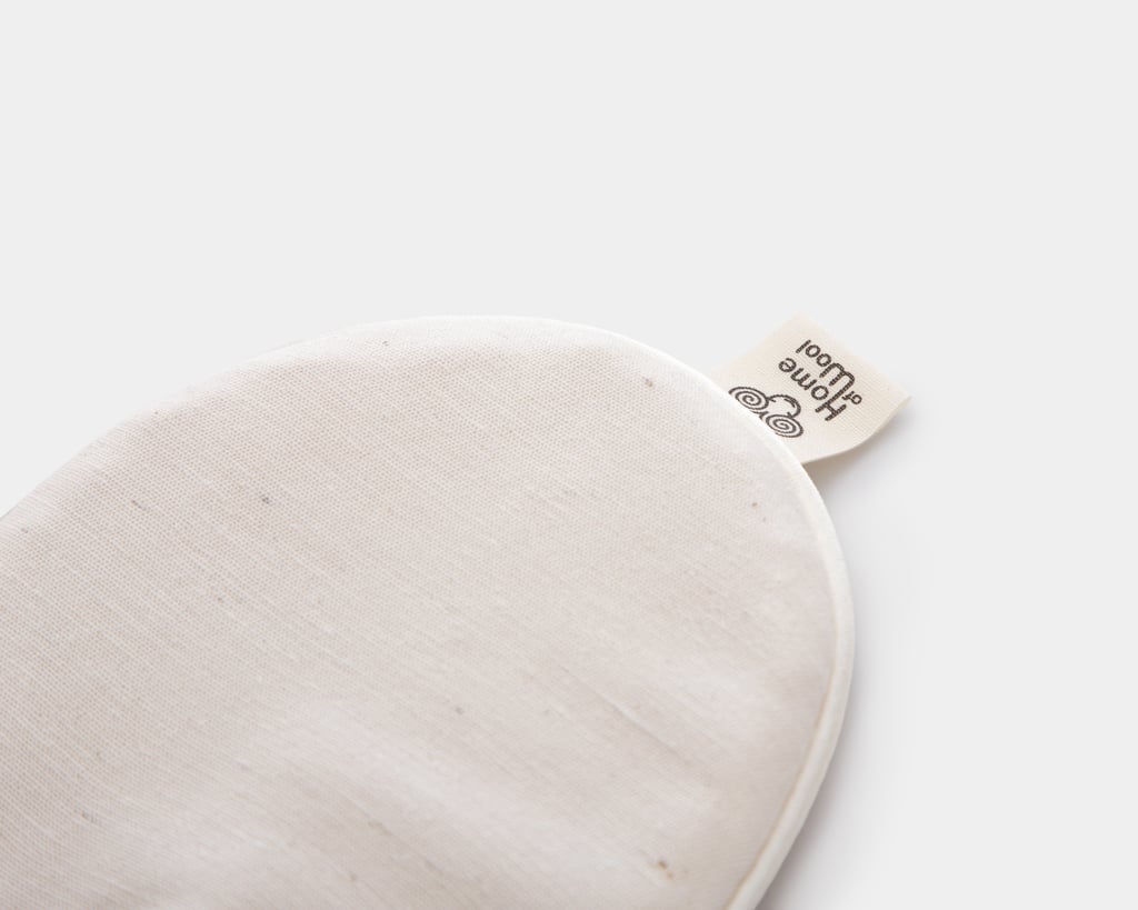 detail of sleeping mask with logo home of wool with