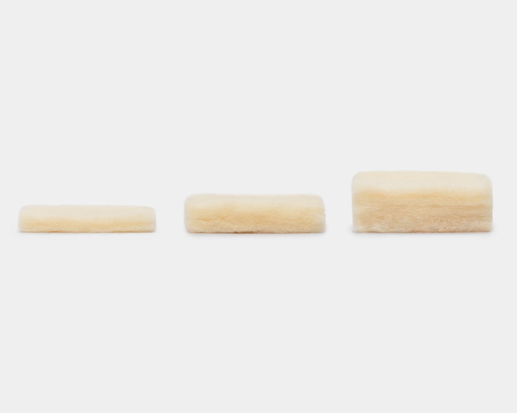three pieces of wool batting