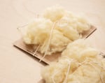 two pieces of wool filling samples