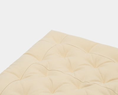 detail of Home od wool zero waste topper in 100%virgin wool fabric