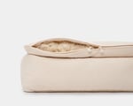 wool cat bed with open wool cushion showing wool
