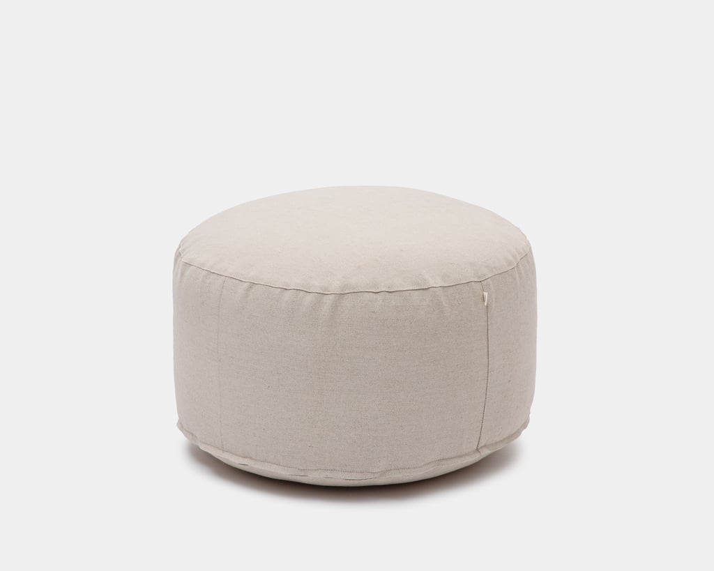 home of wool round pouf in linen fabric