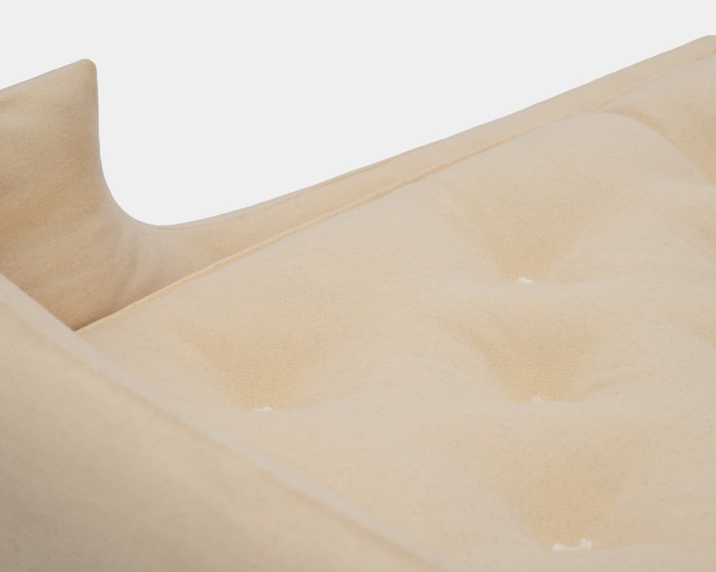 detail of wool montessori bed with boards