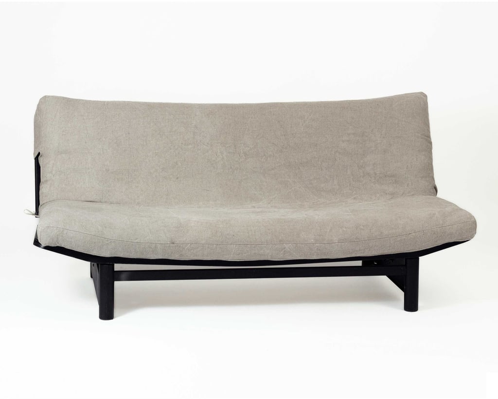 futonmadrass i ull på en sofa