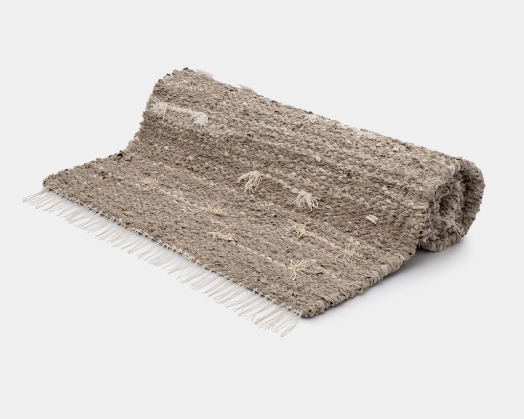 zero waste linen rug rolled up