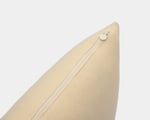 wool pillow protector on a pillow, showing the zipper
