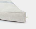 wool trapezoid tufted seat cushion with removable linen cover detail