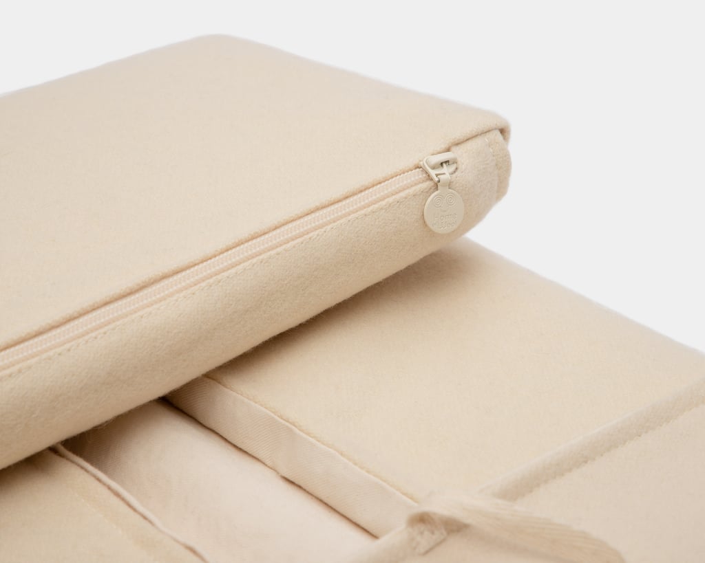home of wool portable changing pad folded up close up