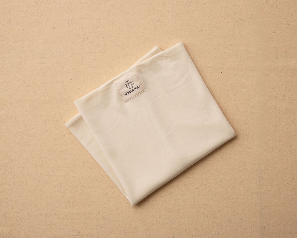 merinoull buff på beige bakgrund