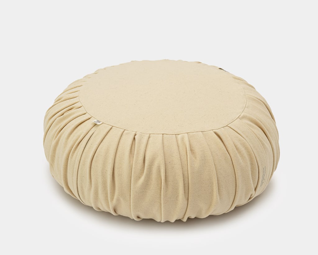 round ottoman pouf from virgin wool fabric