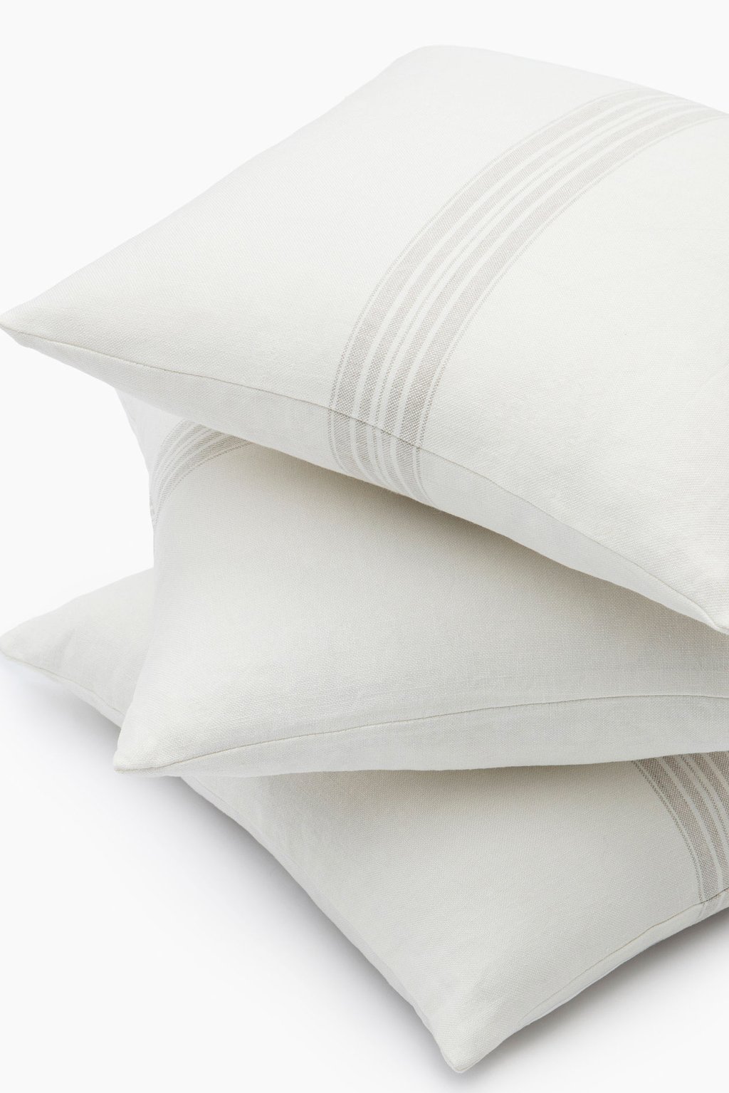 Wool throw pillows stacked