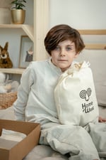 happy boy with home of wool diy stuffed animals