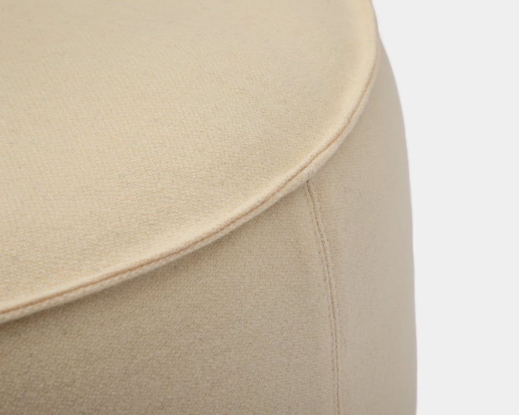detail of round pouf home of wool