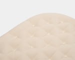 close up of stokke crib wool mattress for kids