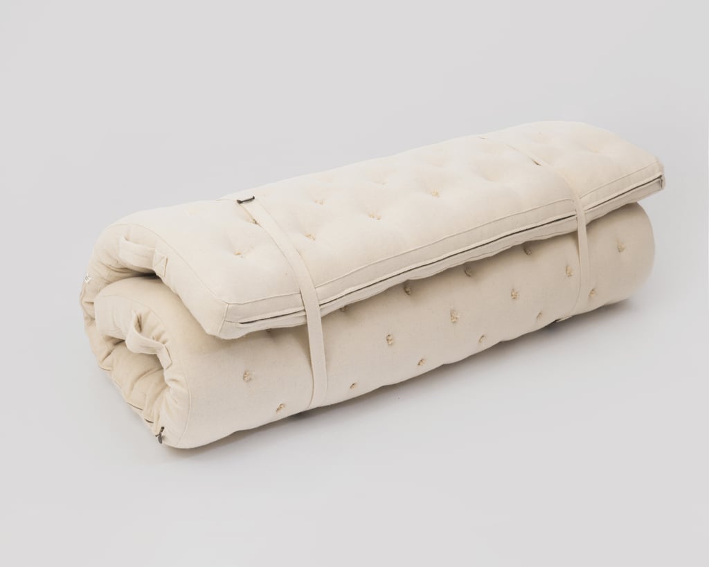 rolled up mattress home of wool