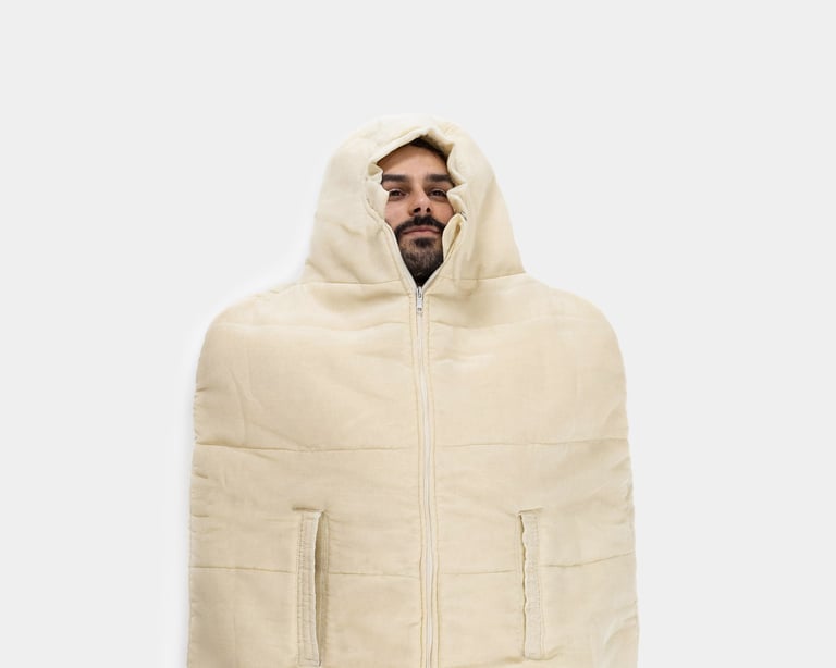 trek pro sleeping bag with a person inside