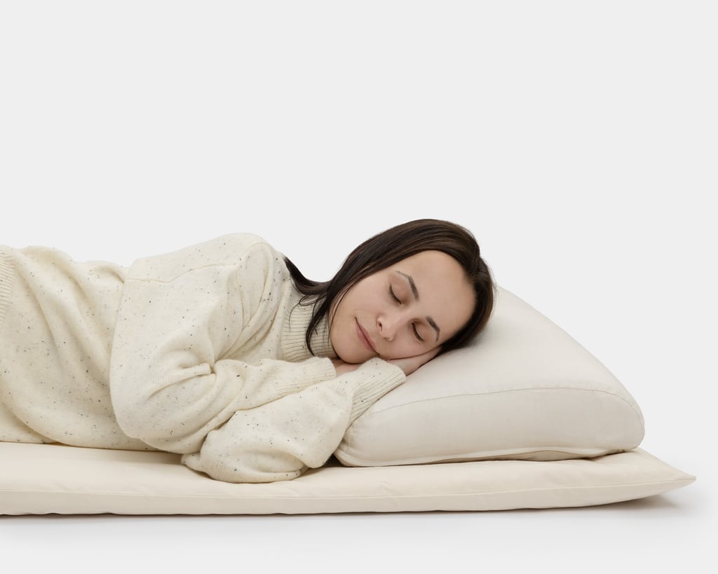 sleeping woman on a woolen sleeping floor mat