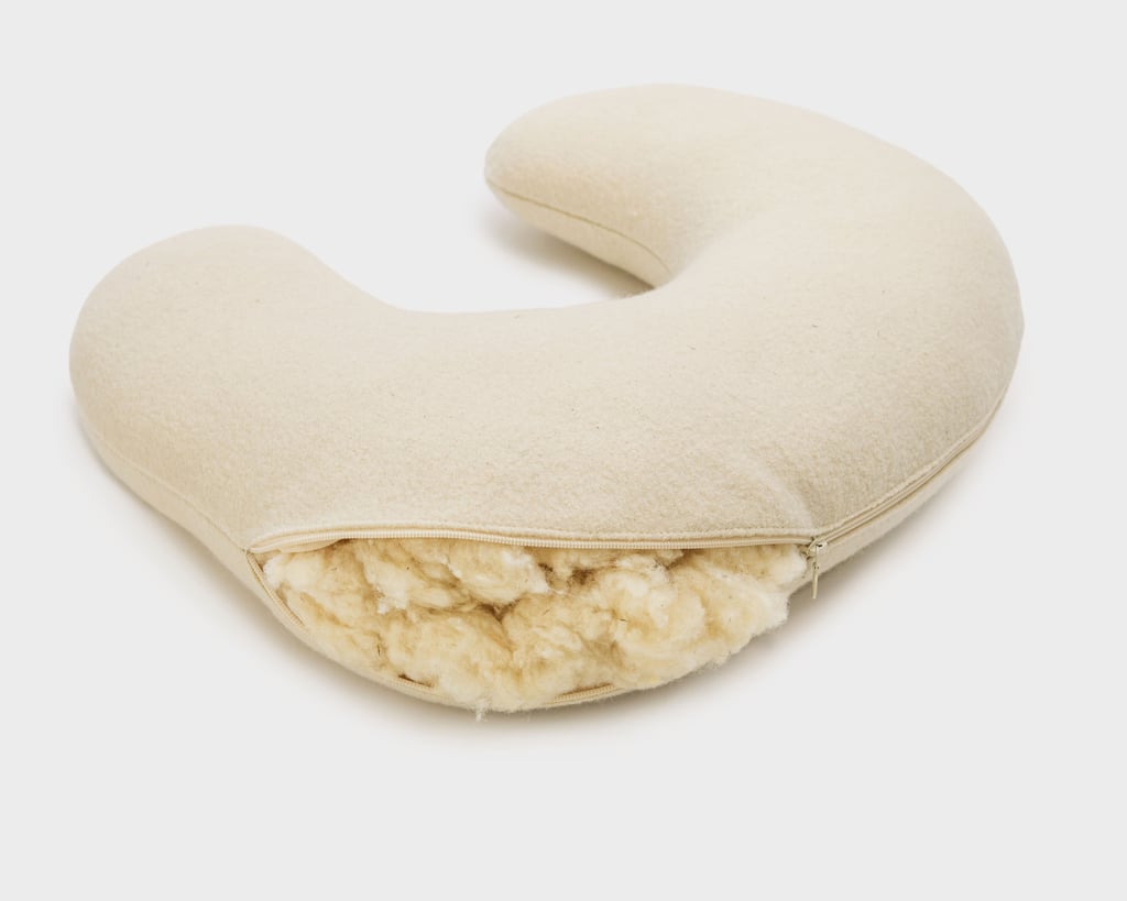 Ammepute med glidelås åpen, som viser ullinnlegget